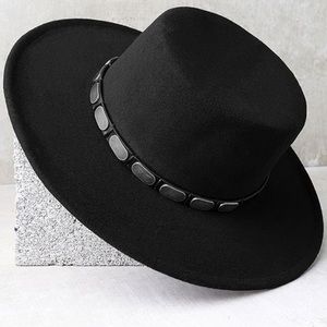 Felted hat with silver accents and flat top